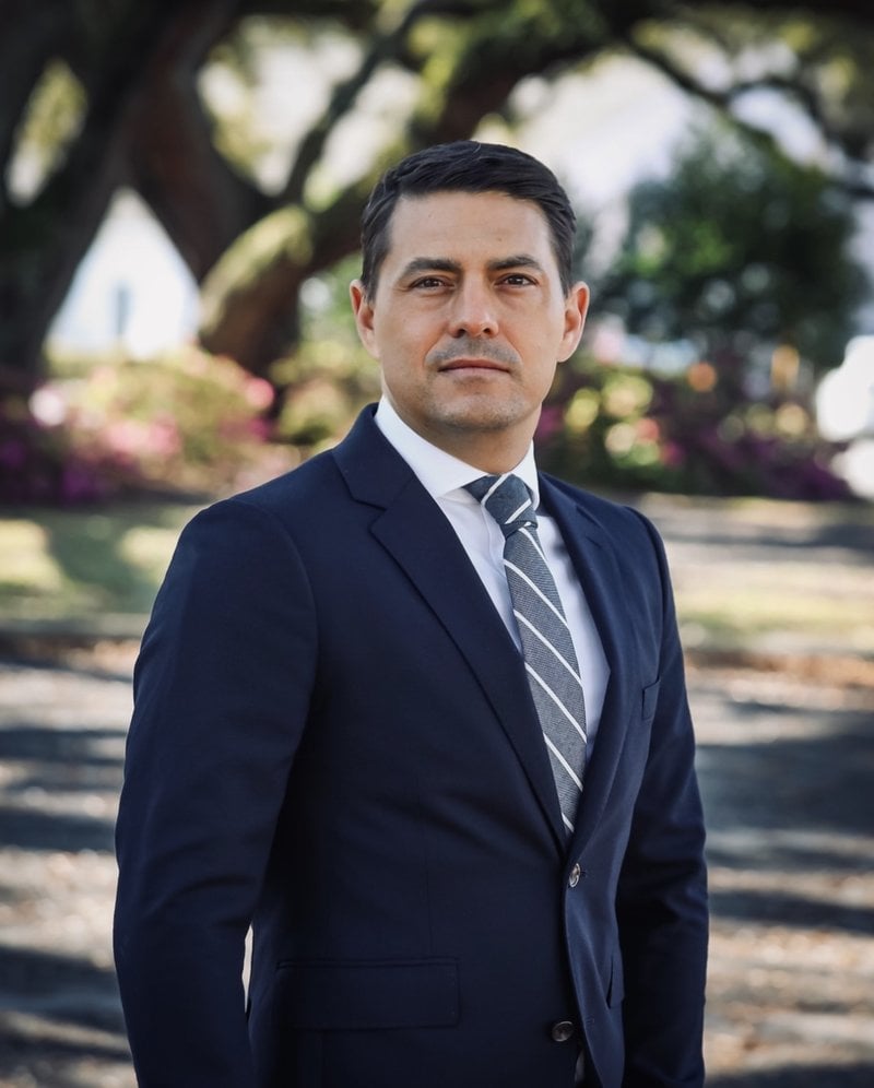 Attorney Joshua H. Tetterton photographed outdoors in Beaufort, North Carolina